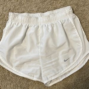 White nike running shorts
